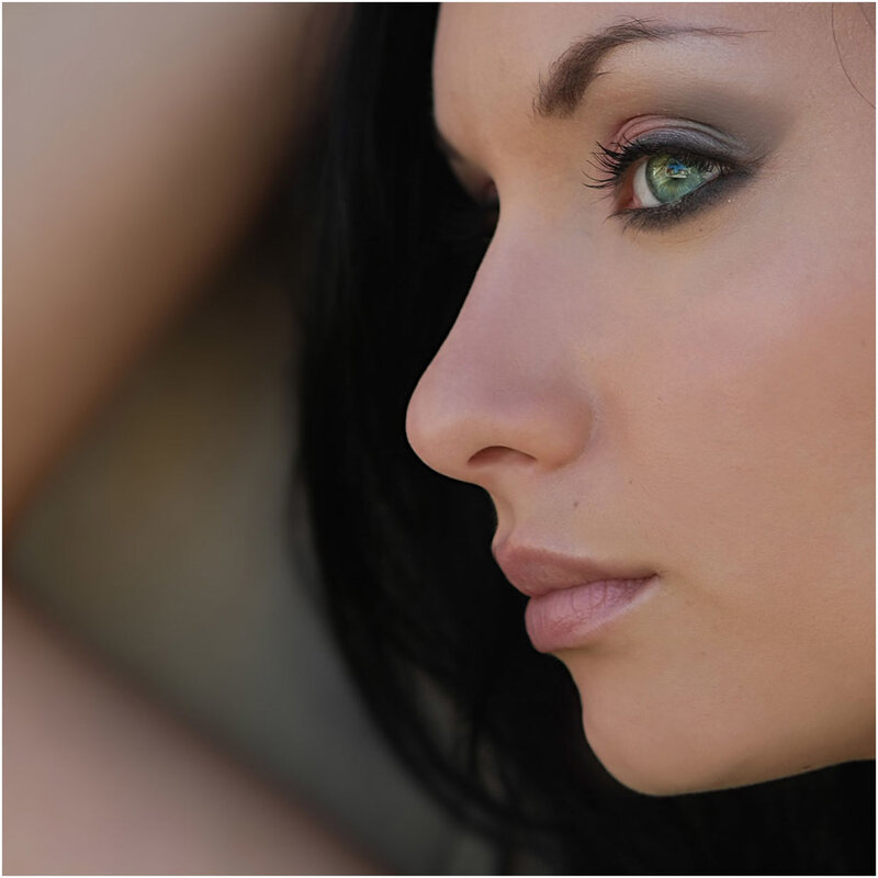 woman with green eyes in profile