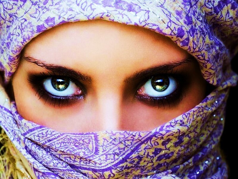 woman with green eyes in purple scarf
