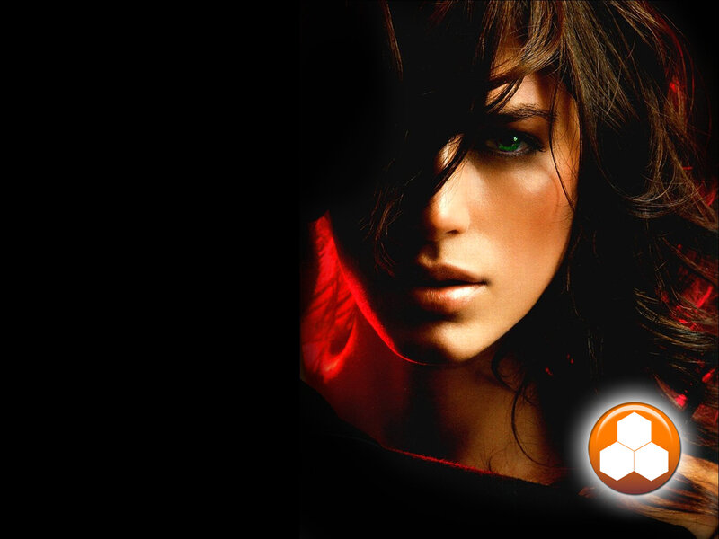 woman with green eyes in red light