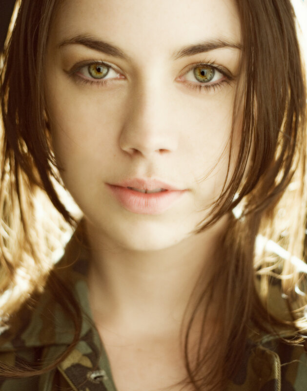 woman with green eyes in sunlight