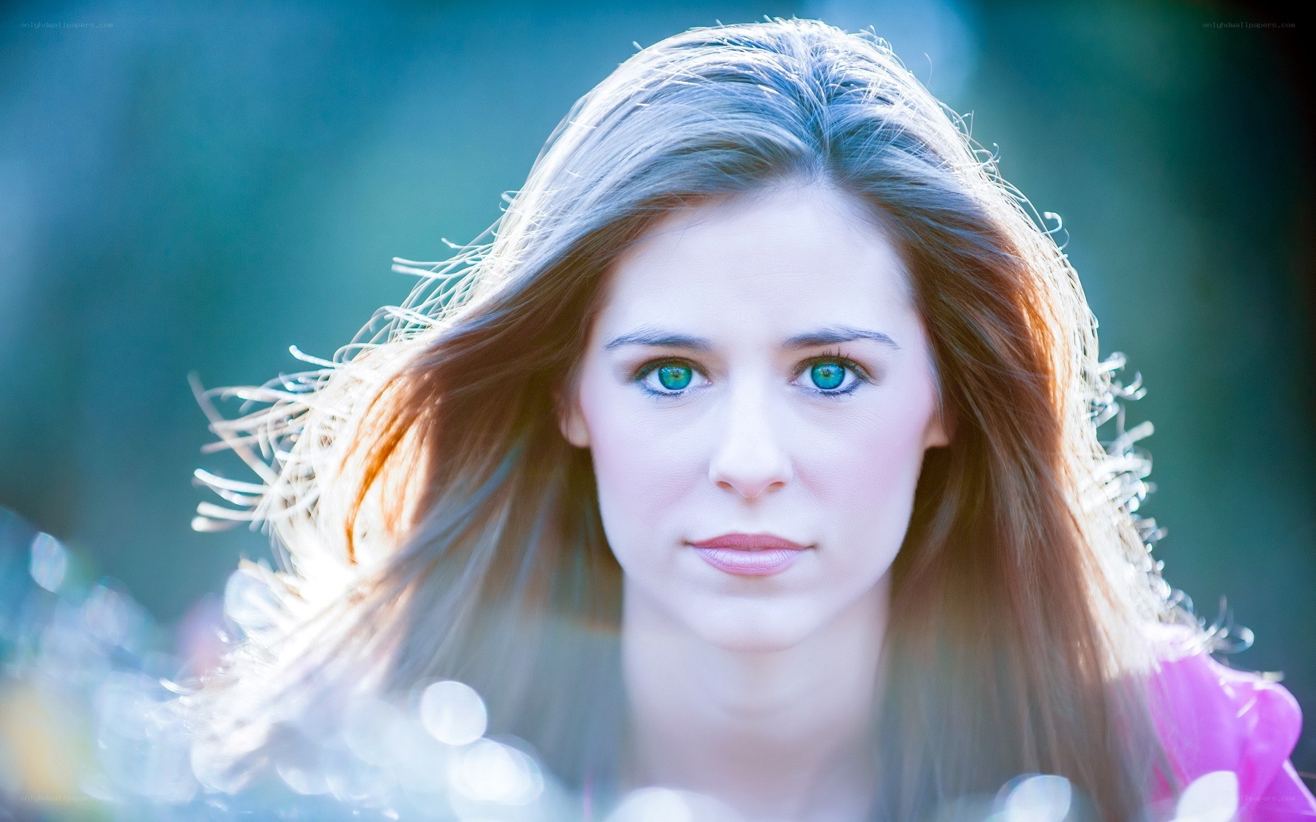 woman with green eyes in sunlight