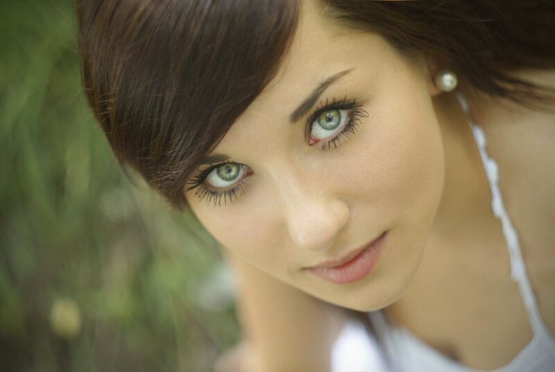 woman with green eyes looking at camera