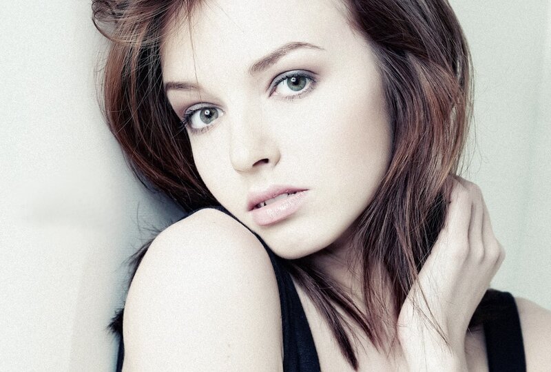 woman with green eyes looking at camera