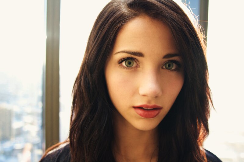 woman with green eyes looking at camera