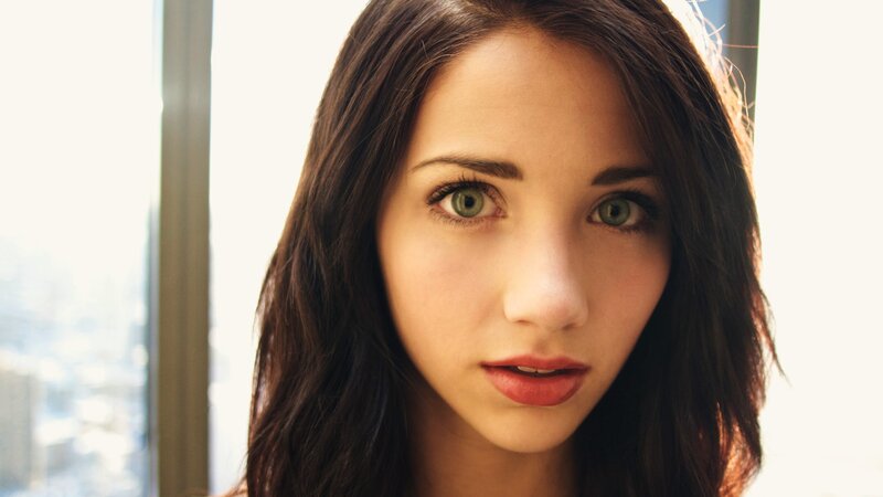 woman with green eyes looking at camera