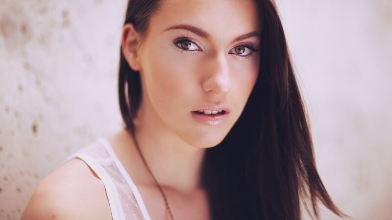 woman with green eyes looking at camera