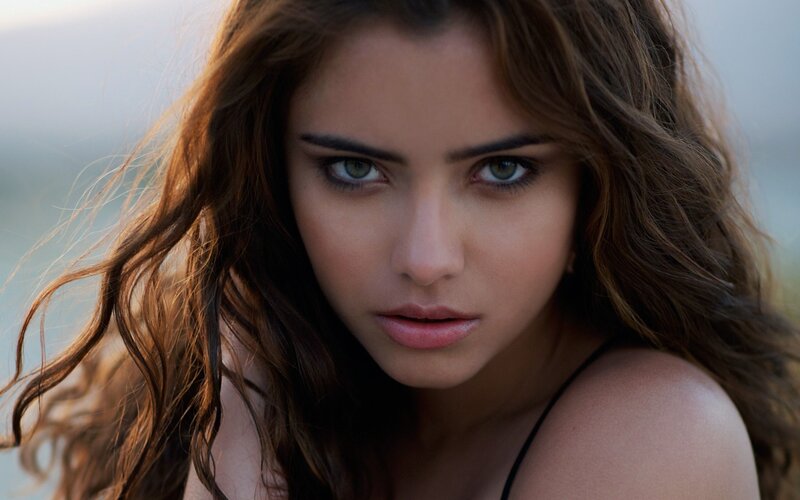 woman with green eyes looking at camera
