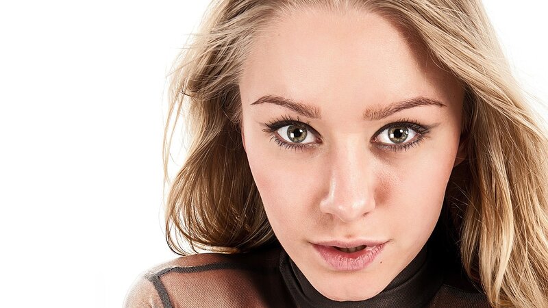 woman with green eyes looking at camera