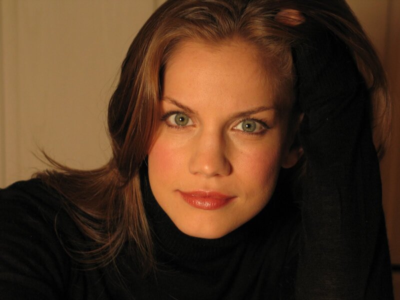 woman with green eyes looking at camera