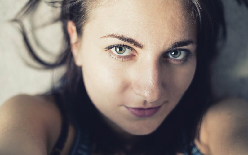 woman with green eyes looking at camera