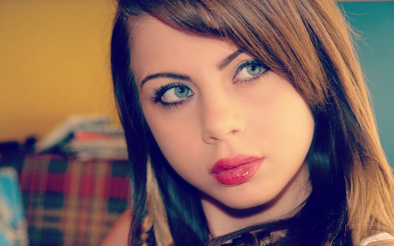 woman with green eyes looking at camera