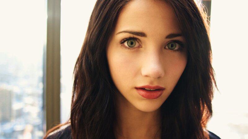 woman with green eyes looking at camera