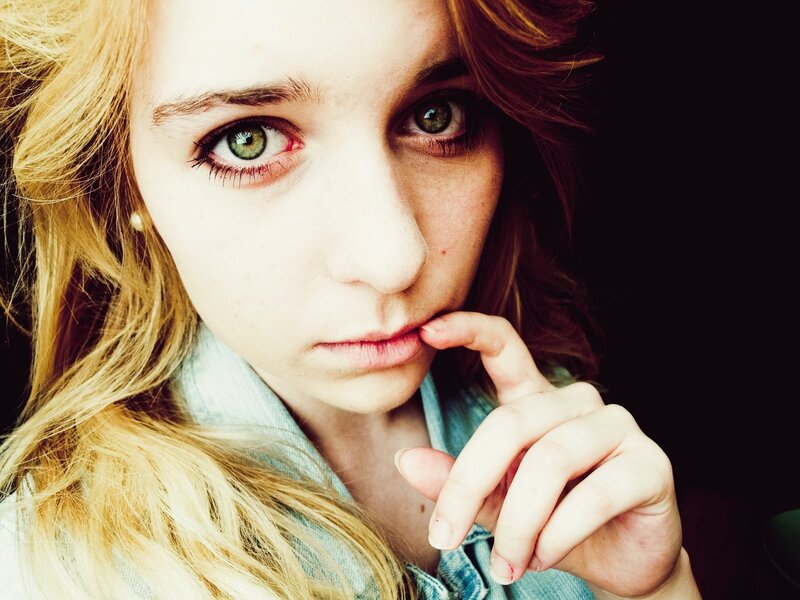 woman with green eyes looking at camera