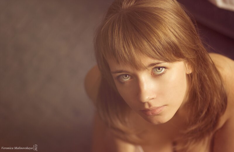woman with green eyes looking at camera