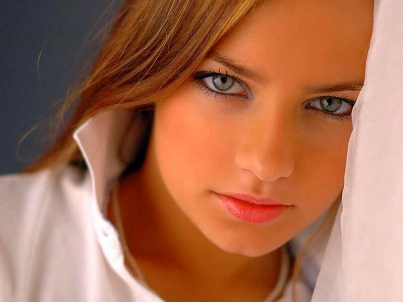 woman with green eyes looking at camera