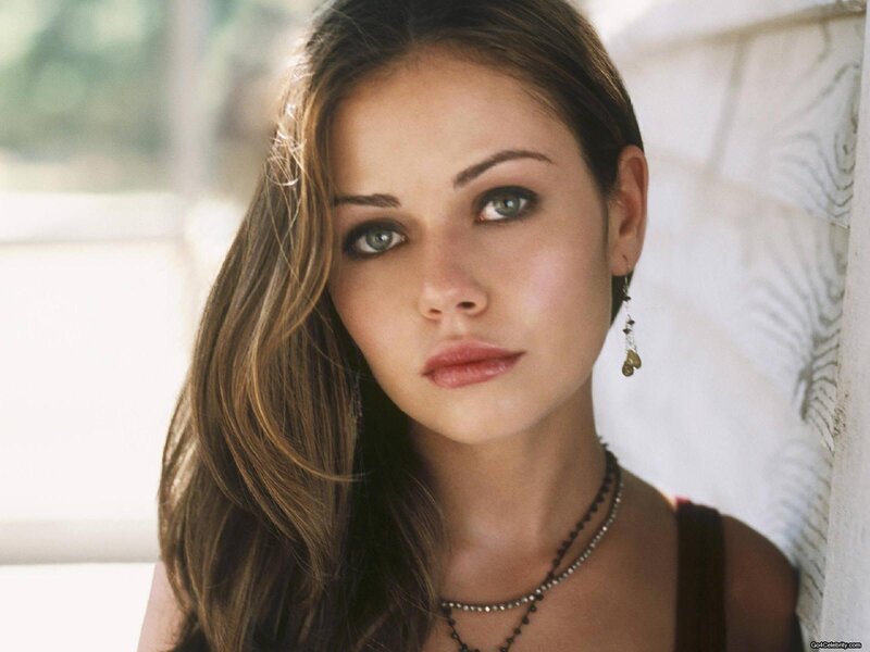 woman with green eyes looking at camera