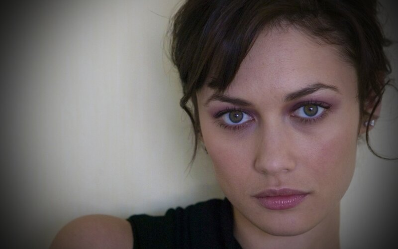 woman with green eyes looking at camera