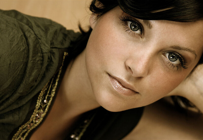 woman with green eyes looking at camera