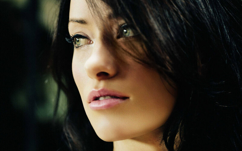 woman with green eyes looking away