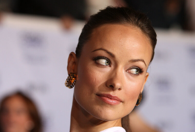 woman with green eyes looking up