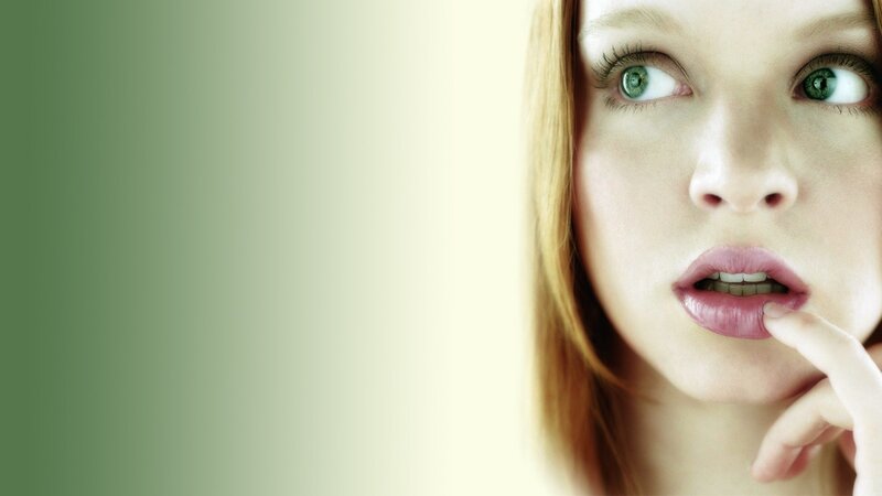 woman with green eyes looking up
