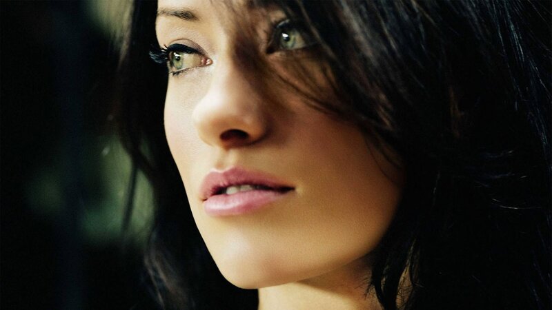 woman with green eyes looking up