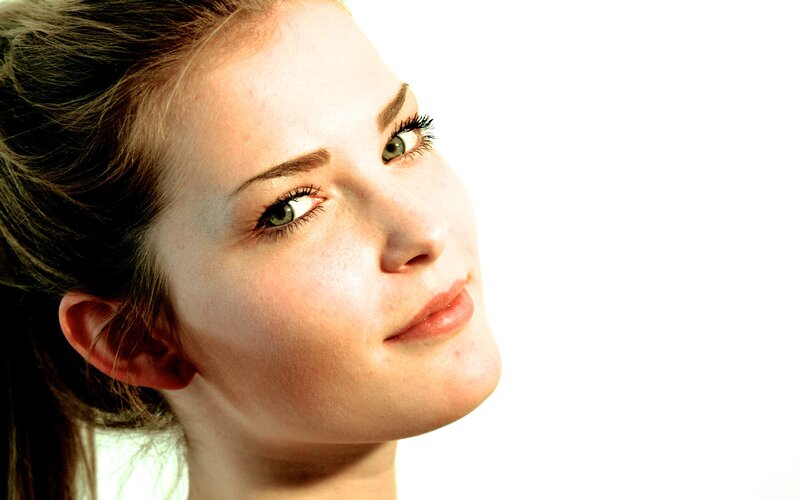 woman with green eyes looking up