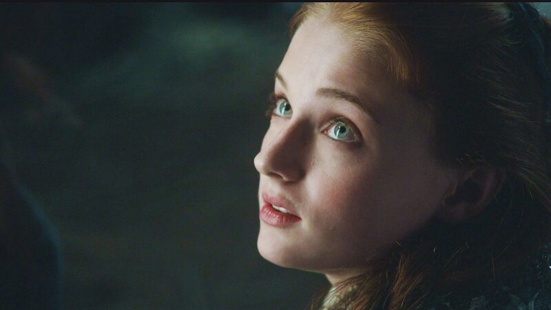 woman with green eyes looking up