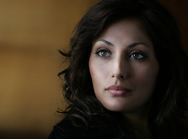 woman with green eyes looking up