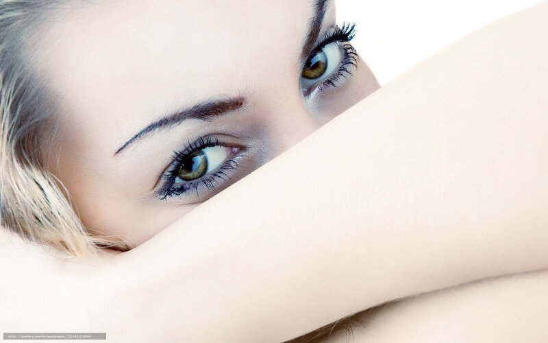 woman with green eyes peeking