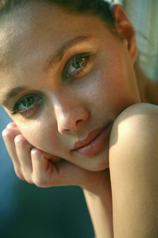 woman with green eyes resting