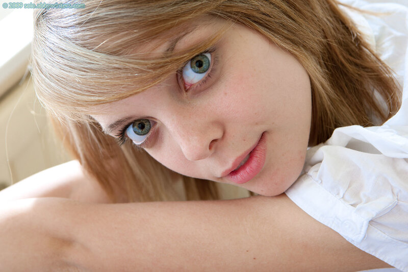 woman with green eyes resting