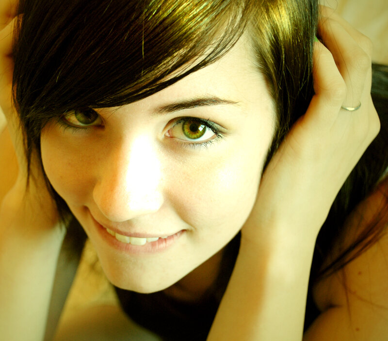 woman with green eyes smiling