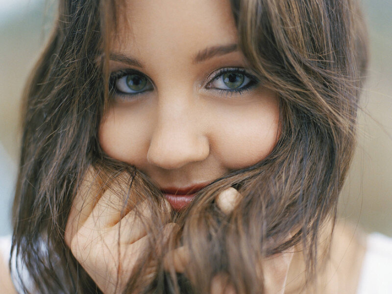 woman with green eyes smiling