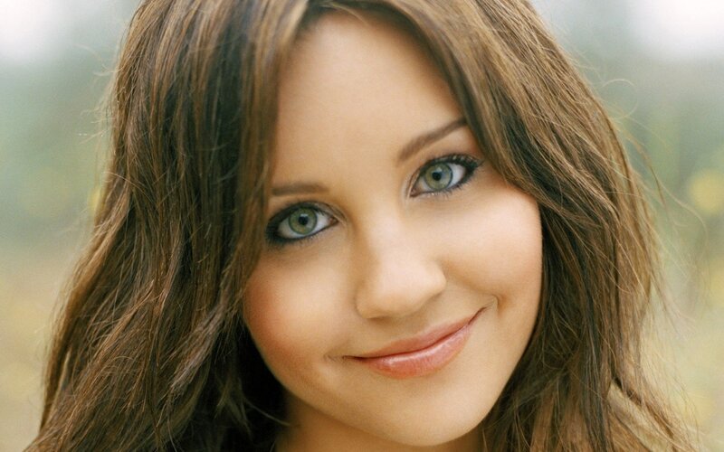 woman with green eyes smiling