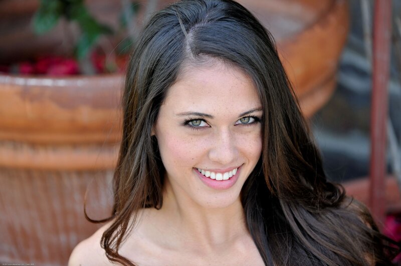 woman with green eyes smiling