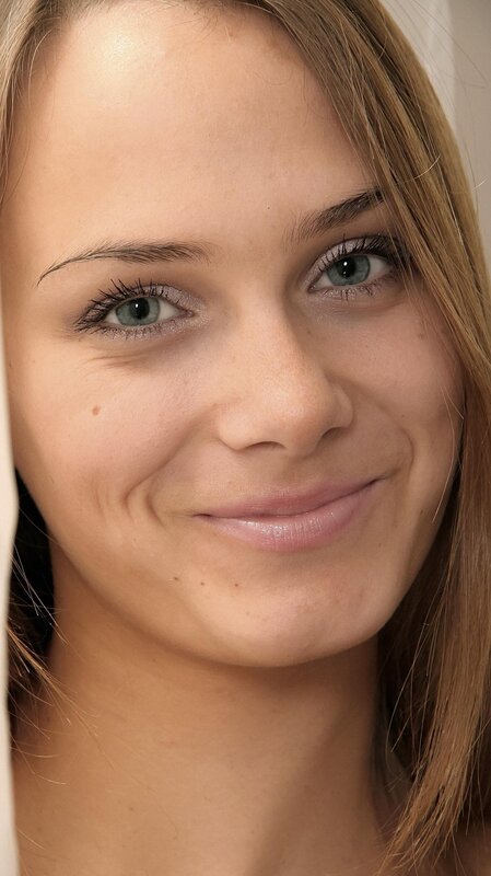 woman with green eyes smiling
