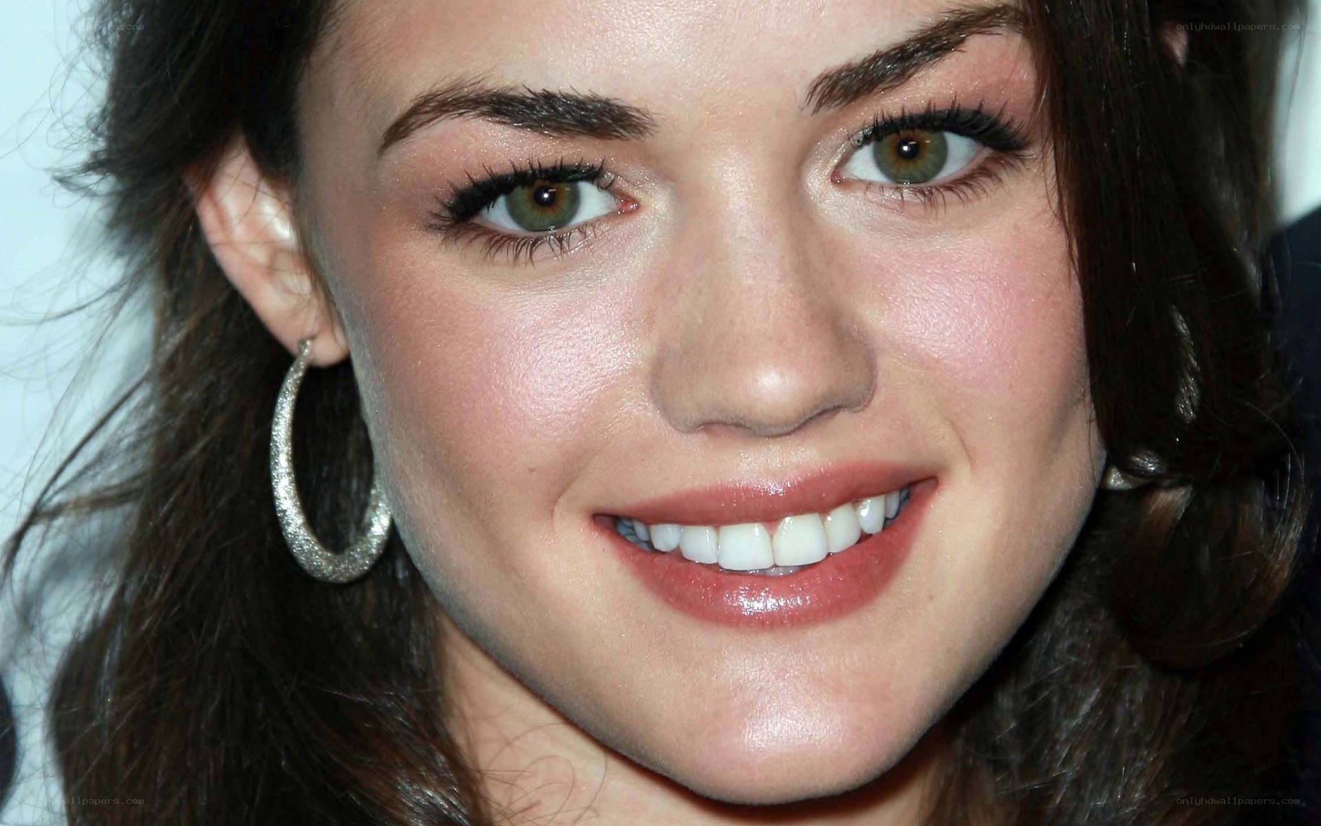 woman with green eyes smiling