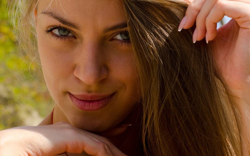 woman with green eyes smiling