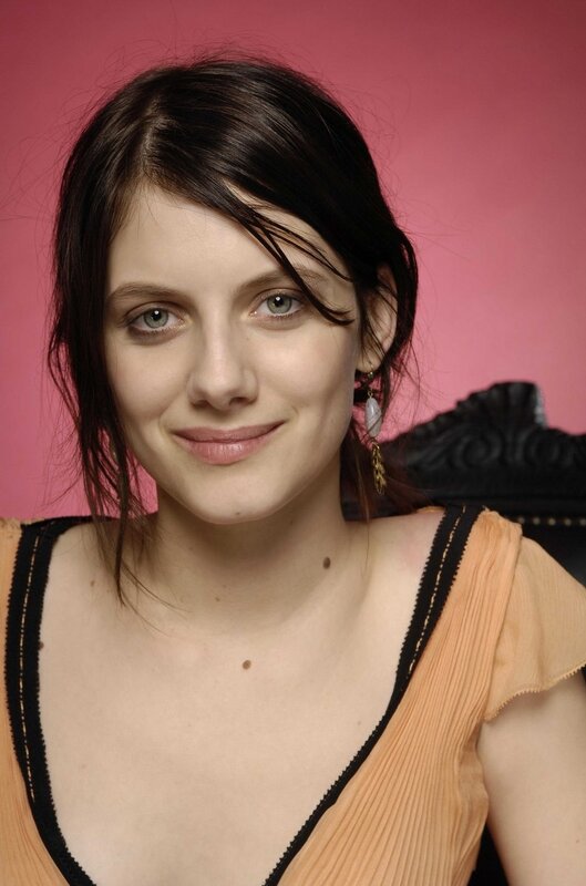 woman with green eyes smiling
