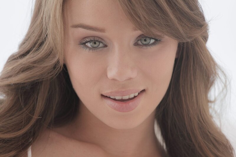 woman with green eyes smiling