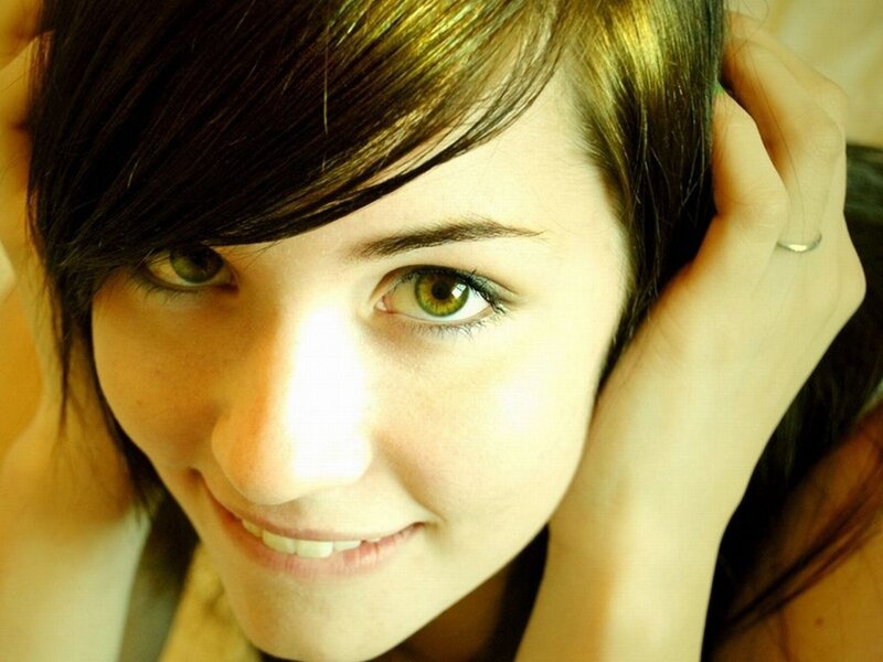 woman with green eyes smiling