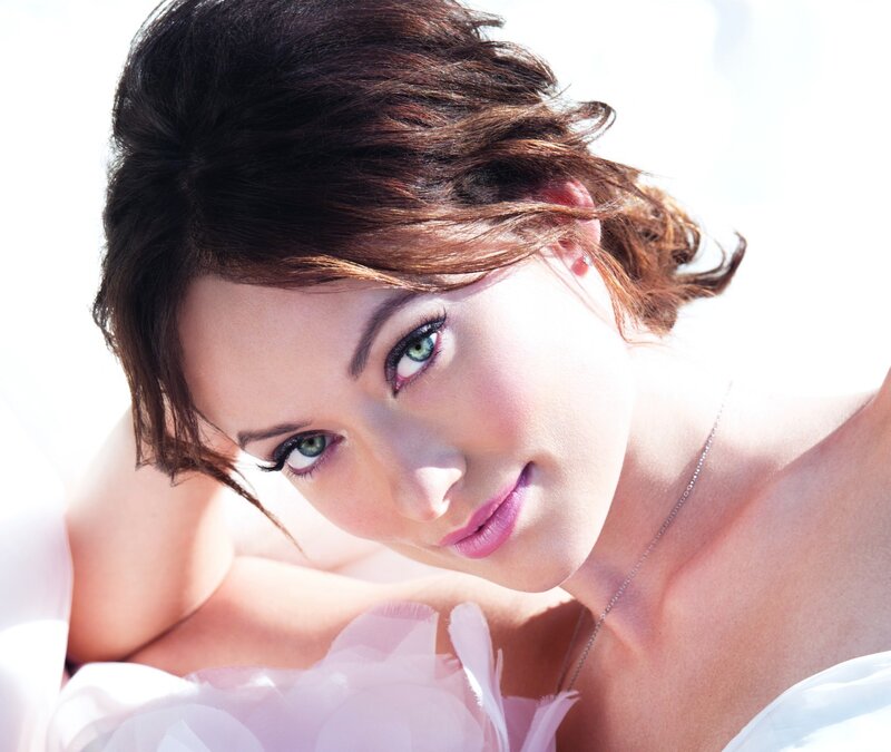woman with green eyes smiling