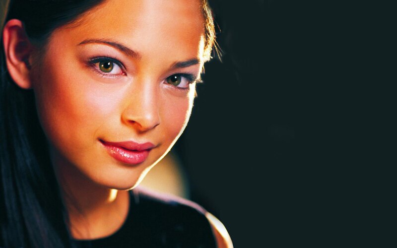woman with green eyes smiling