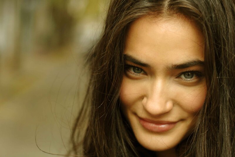 woman with green eyes smiling
