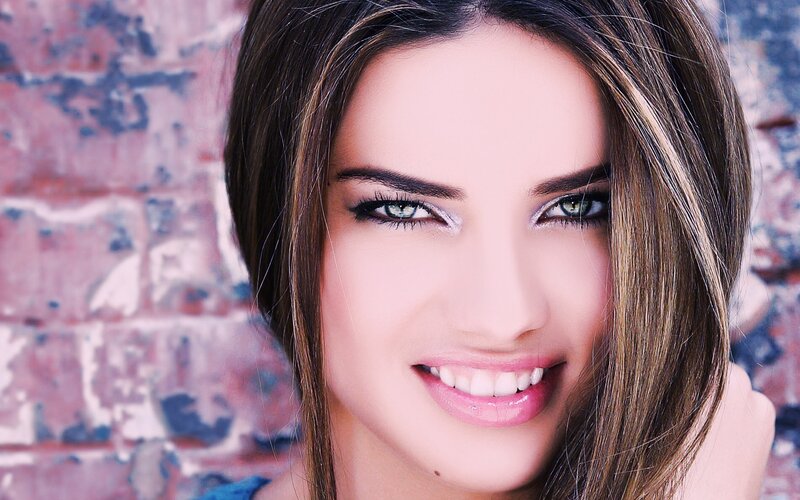 woman with green eyes smiling