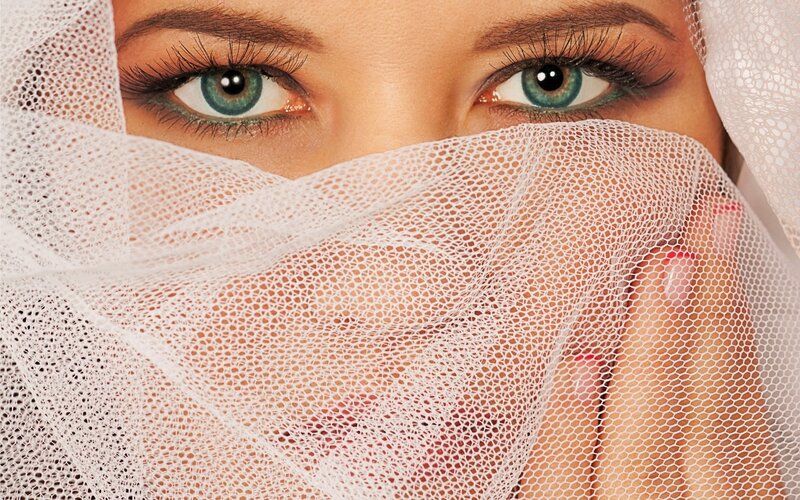 Woman with Green Eyes — White, Dramatic, Photograph, Veil