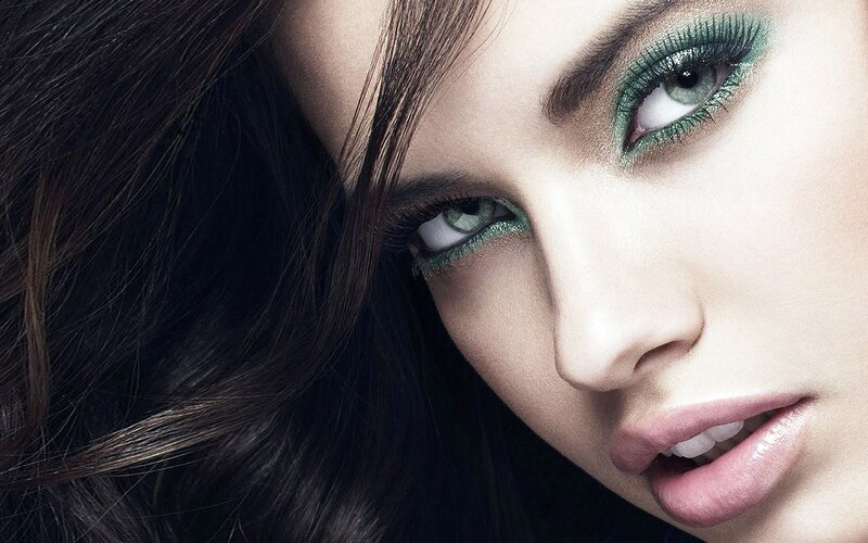 woman with green eyeshadow