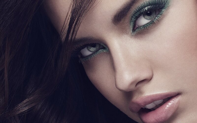 woman with green eyeshadow