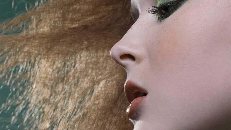 woman with green eyeshadow